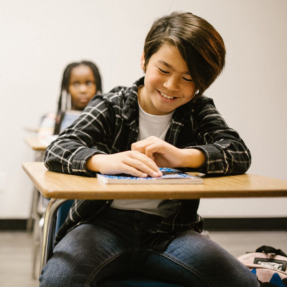 Child starting school with a smile